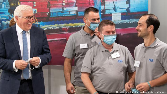 German President Steinmeier talks to workers on the 60th anniversary of the German-Turkish recruitment agreement 