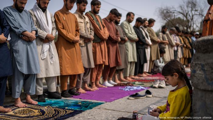 Men at Friday prayers in Kabul