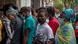 A Haitian family lines up at a migrant shelter in Mexico as they try to get into the US A Haitian family lines up at a migrant shelter in Mexico as they try to get into the US