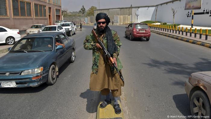 A Taliban fighter with machine gun on the streets of Kabul 