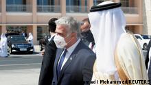30.09.21 *** Israeli Foreign Minister Yair Lapid is received by Bahrain's Foreign Minister Abdullatif Al-Zayani upon his arrival at Bahrain International Airport in Muharraq, Bahrain, September 30, 2021. REUTERS/Hamad I Mohammed