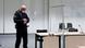 A judicial officer looks at his watch prior to a trial against a 96-year-old former secretary for the SS commander of the Stutthof concentration camp at the court room in Itzehoe, northern Germany A judicial officer looks at his watch prior to a trial against a 96-year-old former secretary for the SS commander of the Stutthof concentration camp at the court room in Itzehoe, northern Germany
