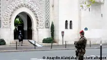 Armed soldiers patrol and stand outside the Grand Mosque in Paris, France, on November 21, 2015 . Following the terrorist attacks in Paris last week, which claimed 130 lives and injured hundreds more, the Muslim community of Paris has seen an increase in security as Paris remains on a high security alert. Photo by Alain Apaydin/ABACAPRESS.COM