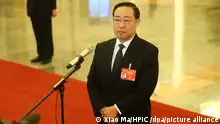Minister of Justice Fu Zhenghua receives an interview before the third plenary meeting of the second session of the 13th National People's Congress (NPC) at the Great Hall of the People in Beijing, China, 12 March 2019.
