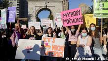 Supporters of reproductive choice take part in the nationwide Women's March, held after Texas rolled out a near-total ban on abortion procedures and access to abortion-inducing medications, in New York City, New York, U.S. October 2, 2021. REUTERS/Jeenah Moon