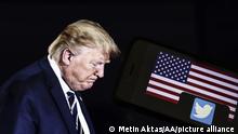 ANKARA, TURKEY - JANUARY 09: In this photo illustration, screens display the logo of twitter, Flag of the United States and Donald Trump in Ankara, Turkey on January 09, 2021. Twitter removes US President Donald Trump's tweets from official POTUS Twitter account. Metin Aktas / Anadolu Agency