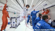 A Barbie doll version of an Italian astronaut Samantha Cristoforetti is seen during a zero-gravity flight with members of the European Space Agency in an unknown location. Courtesy of ESA/Simone Marocchi/Handout via REUTERS ATTENTION EDITORS - THIS IMAGE HAS BEEN SUPPLIED BY A THIRD PARTY. MANDATORY CREDIT. NO RESALES. NO ARCHIVES TPX IMAGES OF THE DAY