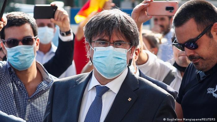 Catalan separatist leader Carles Puigdemont arrives at a courthouse in Sardinia, as a judge holds the first hearing on his European arrest warrant