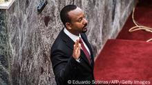 Abiy Ahmed, Prime Minister of Ethiopia, swears in front of the parliament as reelected Prime Minister during a swearing-in ceremony for recently elected members, in the city of Addis Ababa, Ethiopia, on October 04, 2021. - Ethiopian Prime Minister Abiy Ahmed was sworn in for a new five-year term Monday, but the milestone risked being undermined by growing alarm over the war in the north. (Photo by EDUARDO SOTERAS / AFP) (Photo by EDUARDO SOTERAS/AFP via Getty Images)