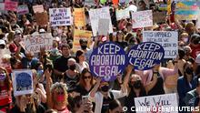 Supporters of reproductive choice take part in the nationwide Women's March, held after Texas rolled out a near-total ban on abortion procedures and access to abortion-inducing medications, in New York City, New York, U.S. October 2, 2021. REUTERS/Caitlin Ochs