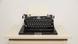 A typewriter on a table A typewriter on a table