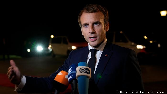 French President Emmanuel Macron speaks to the press