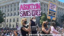 Photo by: STRF/STAR MAX/IPx 2021 10/6/21 Federal judge issues order blocking Texas' 6-week abortion ban. STAR MAX File Photo: 10/2/21 Atmosphere at The Women's March 'Rally For Abortion Justice' in Washington, D.C. on October 2, 2021. Demonstrators assembled at Freedom Plaza and marched to Supreme Court Plaza where they were met with anti-abortion counter-protesters in favor of pro-life movements. In addition to generally supporting a woman's right to choose and the Pro-Choice Abortion Rights Movement, this demonstration is in direct response to the near-total ban on abortions in Texas which became law on September 1st 2021. In addition, more than 650 similar rallies are taking place in cities across The United States of America. (Washington, D.C.)