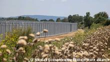 Greece is reinforcing the Greek Turkish borders with personnel, cameras, drones, heavy vehicles, FRONTEX officers but also with a 5 meter tall fence. The fence is actually a concrete filled, a construction for at least 40KM, a long coverage in the wetlands of Evros river (Meric in Turkish), Greece's river border with Turkey. EU is supporting the border fortification financially. Asylum seekers, migrants and refugees used Evros as an entrance point to Europe, while in March 2020 a huge wave of thousands of people tried to cross the borders. Poros Village, Evros region, Greece on June 18, 2021 (Photo by Nicolas Economou/NurPhoto)