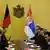 Njemačka i srbijanska delegacija za stolom iznad kojeg su zastave dviju zemalja