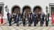 Members of Tunisia's new government stand on the steps of a government building Members of Tunisia's new government stand on the steps of a government building