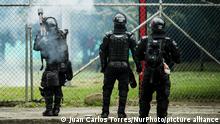 Police officers use tear gas to remove protesters during National strike against Colombian government, in Cali, Colombia on January 21, 2020. (Photo by Juan Carlos Torres/NurPhoto)