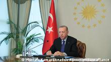 ISTANBUL, TURKEY - OCTOBER 12: Turkish President Recep Tayyip Erdogan attends G20 extraordinary meeting on Afghanistan via video conference, at Vahdettin Mansion, in Istanbul, Turkey on October 12, 2021. Mustafa Kamaci / Anadolu Agency