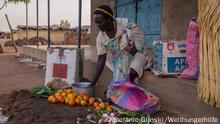 In a village market in South Sudan, a woman sells fruits and vegetables to make a living. Resilient food systems contribute to peacebuilding by strengthening livelihood security. In conflict areas, in particular, local markets, therefore, play an important role in dealing with the consequences of a conflict. ***Fotos nur im Welthungerhilfe Kontext nutzen und nicht an Dritte weitergegeben! Bilder muessen mit dem Credit Copyright ?Fotograf?/Welthungerhilfe versehen werden. These pictures are the property of Welthungerhilfe and must be used in the context of We