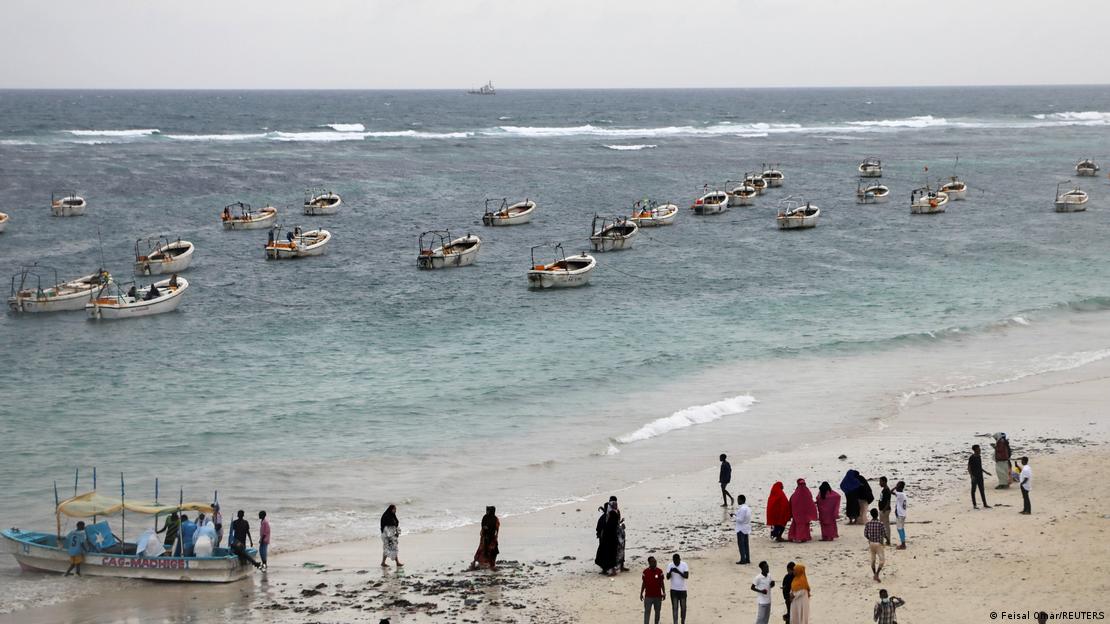 Boats and people pictured on Liido beach in Mogadishu in 2021 Boats and people pictured on Liido beach in Mogadishu in 2021