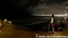 A man watches the sea from the Malecon as storm Pamela approaches the Pacific coast resort, in Mazatlan, Mexico October 12, 2021. REUTERS/Daniel Becerril