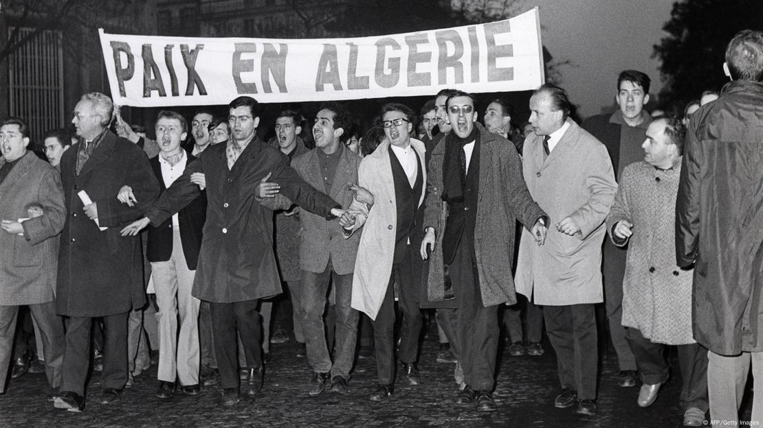 Demonstrators shout slogans in favor of independence and peace in Algeria on the Grands Boulevards in Paris on November 18, 1961