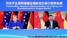 (211013) -- BEIJING, Oct. 13, 2021 (Xinhua) -- Chinese President Xi Jinping meets with German Chancellor Angela Merkel via video link in Beijing, capital of China, Oct. 13, 2021. (Xinhua/Liu Bin)