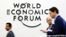 Attendees are seen during the World Economic Forum (WEF) annual meeting in Davos, Switzerland, January 22, 2019. REUTERS/Arnd Wiegmann