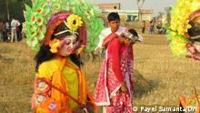 Chhou artists of Puruliya are in trouble due to lockdown. They have hoped for happiness and prosperity in this festive season. But the West Bengal Govt has not allowed them to make stage performances in public places. Chhou dancers are putting on their dresses before a programme. West Bengal
