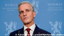 Norway's newly appointed Prime Minister Jonas Gahr Stoere holds a press conference at the Prime Minister's office, in Oslo, Thursday, Oct. 14, 2021. Norwegian authorities say the bow-and-arrow rampage by a man who killed five people in a small town appeared to be a terrorist act. (Hakon Mosvold Larsen/NTB via AP)