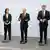 من اليمين: زعيم الليبراليين كريستيان ليندنر وزعيم الاشتراكيين أولاف شولتس مع زعيمي الخضر أنالينا بيربوك وروبرت هابيك