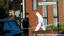 A member of the scientific police enters the scene where MP David Amess was stabbed during constituency surgery, in Leigh-on-Sea, Britain October 15, 2021. REUTERS/Andrew Couldridge