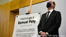 16.10.2021, Paris*** French Prime Minister Jean Castex stands during the unveiling of a memorial plaque at the French Education ministry in Paris, on October 16, 2021, one year after French school teacher Samuel Paty was beheaded by an extremist after showing his class cartoons of the Muslim Prophet Mohammed. - Paty's violent death sent shockwaves through France and beyond, and was seen as an attack on the core values drilled by teachers into generations of schoolchildren, including the separation of church and state and the right to blaspheme. (Photo by JULIEN DE ROSA / AFP) (Photo by JULIEN DE ROSA/AFP via Getty Images)