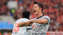 Soccer Football - Bundesliga - Bayer Leverkusen v Bayern Munich - BayArena, Leverkusen, Germany - October 17, 2021 Bayern Munich's Robert Lewandowski celebrates scoring their first goal REUTERS/Thilo Schmuelgen DFL regulations prohibit any use of photographs as image sequences and/or quasi-video.