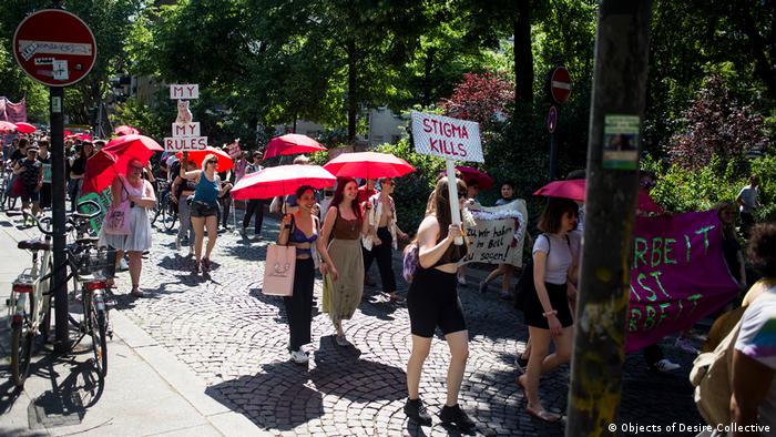 At Berlin's 2019 'Whore Parade,' sex workers hold up signs saying 'stigma kills'