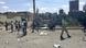 Civilians survey the destruction in Mekele Civilians survey the destruction in Mekele
