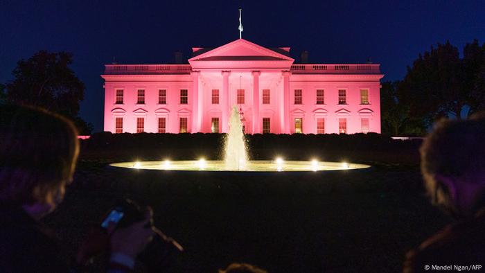 The White House is illuminated in pink for Breast Cancer Awareness month in Washington