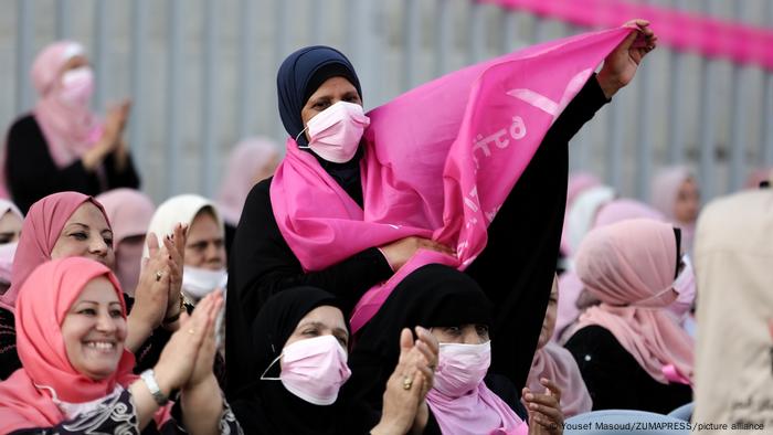 Palestinian women participate in the Pink Sports Day to raise awareness of early screening for breast cancer in Gaza City