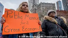 As global leaders assemble for the 4th Annual Climate Finance Day, New Yorkers, including representatives from environmental, community and student groups, held a rally at City Hall on November 28, 2018 and call on NYC to divest public money from banks that fuel climate change and to establish a municipal public bank to help fund the transition to a just, sustainable economy. (Photo by Erik McGregor/Pacific Press)