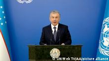 In this photo taken from video, Uzbekistan's President Shavkat Mirziyoyev remotely addresses the 76th session of the United Nations General Assembly in a pre-recorded message, Tuesday, Sept. 21, 2021 at UN headquarters. (UN Web TV via AP)