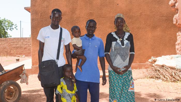 Ouahigouya, Burkina Faso, Jacob Ouermi (middle) and other refugees 