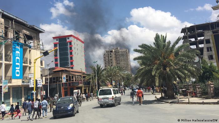 Smoke from a recent military airstrike rises above the streets of Mekele. 