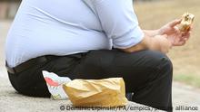 Obesity study. Embargoed to 0001 Wednesday March 8 File photo dated 28/07/10 of an overweight man eating, as a new study suggests that people who think they are discriminated against because of their weight are less likely to exercise than those who do not. Issue date: Wednesday March 8, 2017. Those who felt stigmatised because of their weight had higher odds of being inactive, according to the research published in the journal BMJ Open. See PA story HEALTH Weight. Photo credit should read: Dominic Lipinski/PA Wire URN:30436904