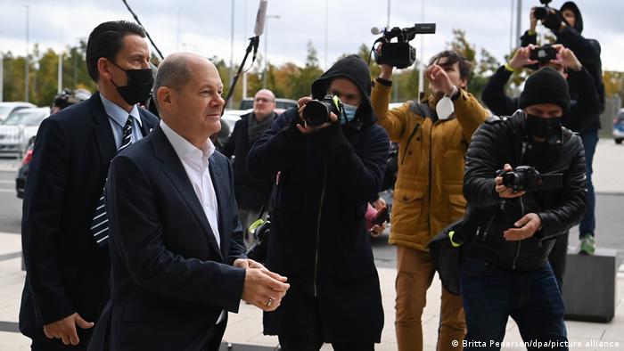 Germany's likely next chanellor, Olaf Scholz of the Social Democrats, arrives at the talks