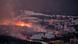 Lava flows from a volcano, destroying houses at La Laguna neighbourhood on the Canary island of La Palma, Spain Lava flows from a volcano, destroying houses at La Laguna neighbourhood on the Canary island of La Palma, Spain