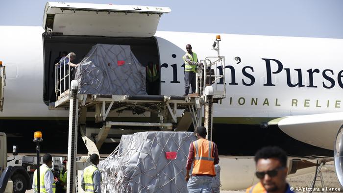 A cargo plane belonging to aid organization Samaritan's Purse unloads aid supplies at Mekele Airport
