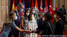 (From L) Spanish Crown Princess of Asturias Leonor, Spain's King Felipe VI, Spain's Queen Letizia and Spanish Princess Sofia greet Co-founder and CEO of German biotechnology company BioNTech Ugur Sahin and Co-founder of BioNTech Ozlem Tureci during an Audience with laureates, ahead of the 2021 Princess of Asturias award ceremony, at the Hotel Reconquista in Oviedo on October 22, 2021. (Photo by ANDER GILLENEA / AFP) (Photo by ANDER GILLENEA/AFP via Getty Images)