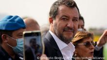 Former minister of interior Matteo Salvini and his lawyer Giulia Bongiorno talk to journalists outside Palermo's court, Italy, Saturday, Oct. 23, 2021. Italy's former right-wing interior minister, Matteo Salvini, went on trial Saturday charged with kidnapping for refusing 2019 to allow a Spanish migrant rescue ship to dock in Sicily, keeping the people onboard at sea for days. (AP Photo/Gregorio Borgia)
