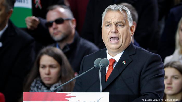 Hungarian Prime Minister Viktor Orban speaking from a podium