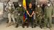 In this photo released by the Colombian presidential press office, Otoniel is presented to the media at a military base In this photo released by the Colombian presidential press office, Otoniel is presented to the media at a military base